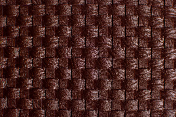 istock Dark brown vintage fabric with woven texture closeup. Textile background macro. A big step 1294643655