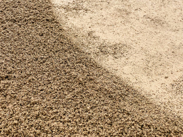 istock Foundation of compressed stone and gravel being laid for artificial grass 1294653134
