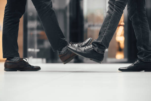 istock close up. young people greeting each other 1294656849
