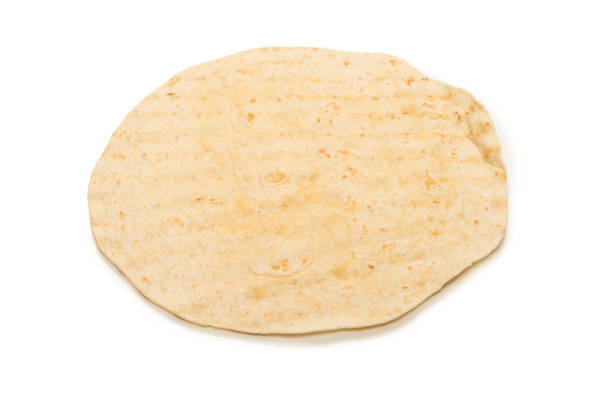 istock Grilled pitta bread isolated on white background. 1294658793