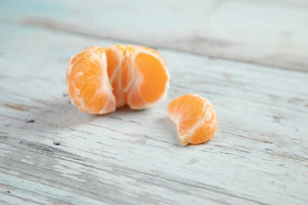 istock mandarin on the wooden table 1294659205