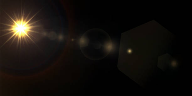 istock Shining golden stars isolated on black background 1294661667
