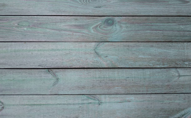 istock Grey-turquoise wooden background. Horizontal boards 1294663303