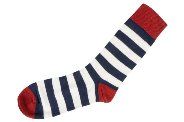 istock One sock with different lines isolated on white background. Colorful sock son white background. Colored socks on the leg isolated on white background 1294663833