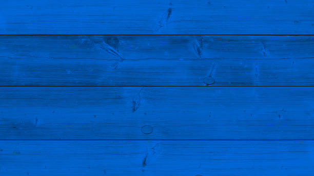 istock Top view of blue background wooden planks board texture. 1294664973
