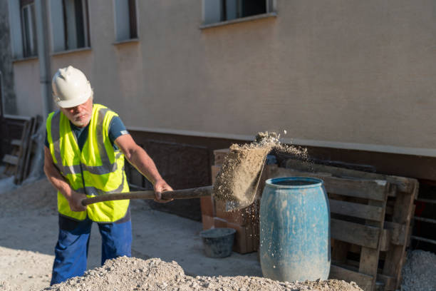 istock Mature men working on construction site at home 1294664978