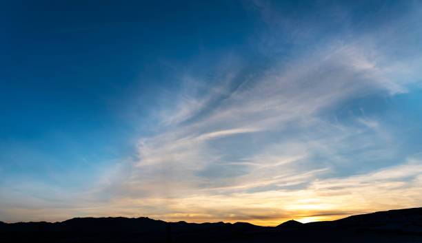istock Beautiful panoramic sunset over the mountains silhouette. 1294666510