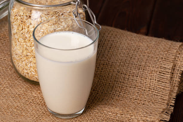 istock Glass cup of milk on table close up 1294670313