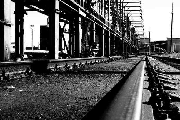 istock Railway tracks in an industrial area. 1294673136