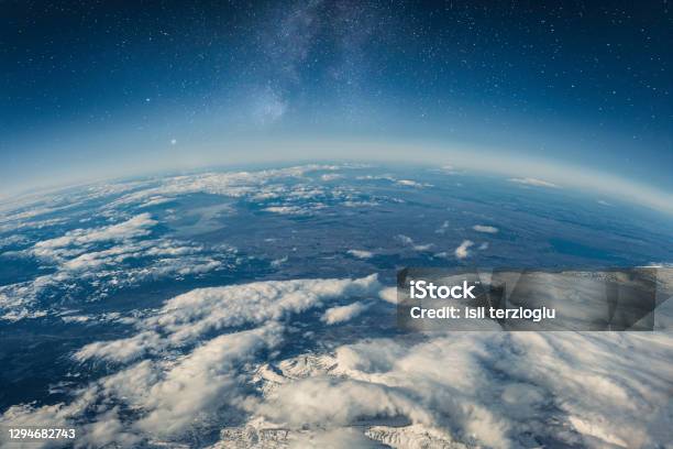 View Of Stars And Milkyway Above Earth From Space Stock Photo - Download Image Now - Globe - Navigational Equipment, Planet Earth, Outer Space