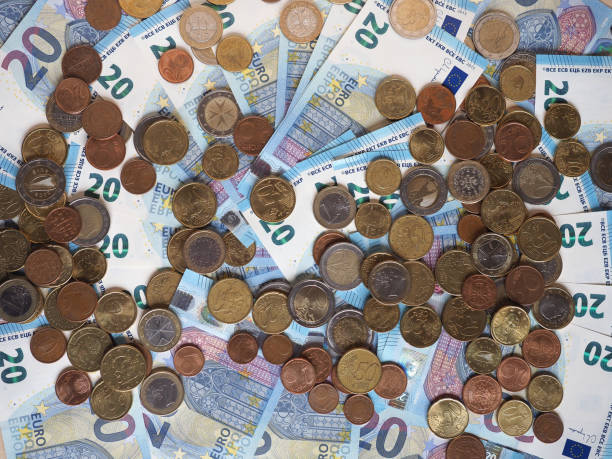 istock Euro notes and coins, European Union 1294686819