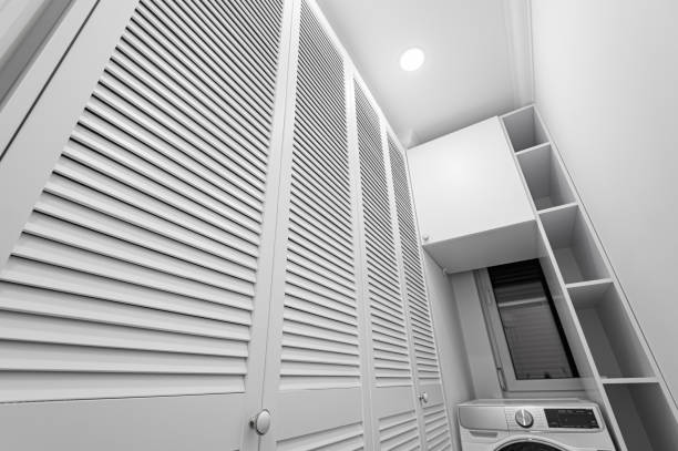 istock White laundry space inside wardobe room in new apartment 1294708780