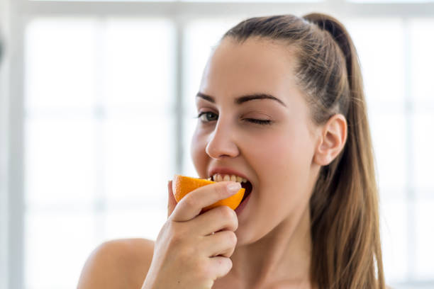 istock A beautiful young woman who prepares fresh after a workout 1294711485