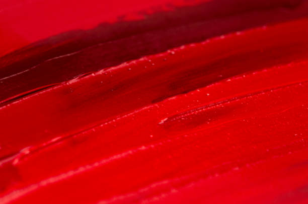 istock A Background of Various Red Oil Paints Perfect for Adding Your Own Text 1294713371