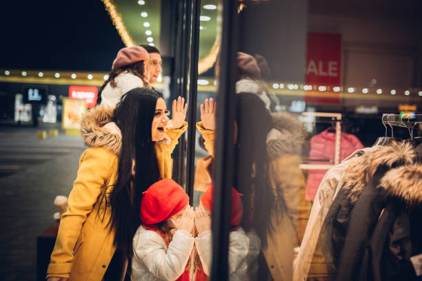 istock Family on Christmas shopping 1294738233