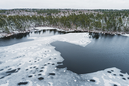 Looking down on newly formed ice in a lake.