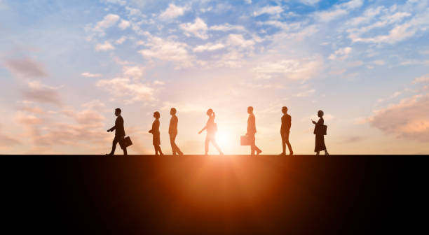 istock Walking group of businessperson. Human resources. 1294749074