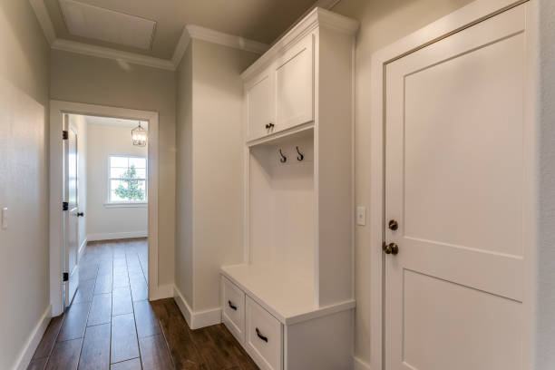 istock Simple and elegant mudroom and entry from garage 1294760291