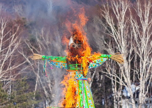Celebration of Maslenitsa - burning effigy made from straw.