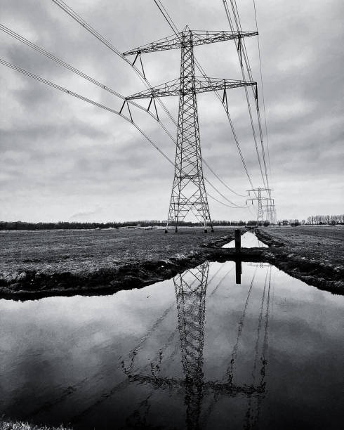 istock Electric grid in rural Amsterdam with reflection in the canal 1294776468