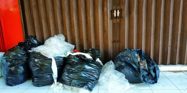istock bags plastic garbage in the street store 1294776995