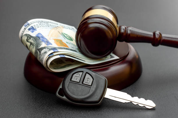 Judge's gavel with car key and money on black. Judge's gavel with car key and money on black. driving under the influence stock pictures, royalty-free photos & images