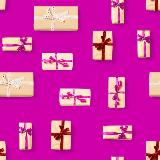 istock Seamless pattern made from gift boxes on pink background presents, gifts minimal concept seamless pattern. Abstract pattern for christmas birthday wedding 1294787545