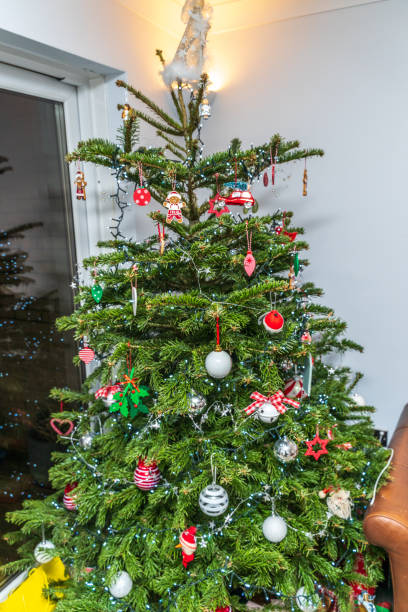istock Christmas Tree and baubles close up 1294789089