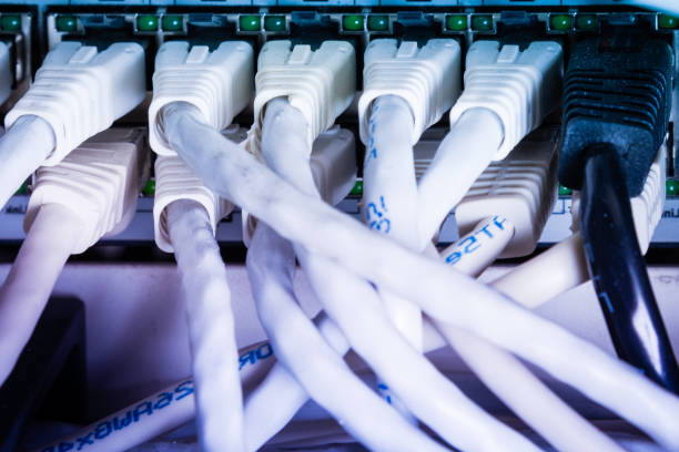 istock close-up of ethernet cables and switch 1294791212