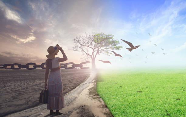 New normal concept New normal concept: Woman standing between climate worsened with good atmosphere and birds flying and broken chain freedom stock pictures, royalty-free photos & images