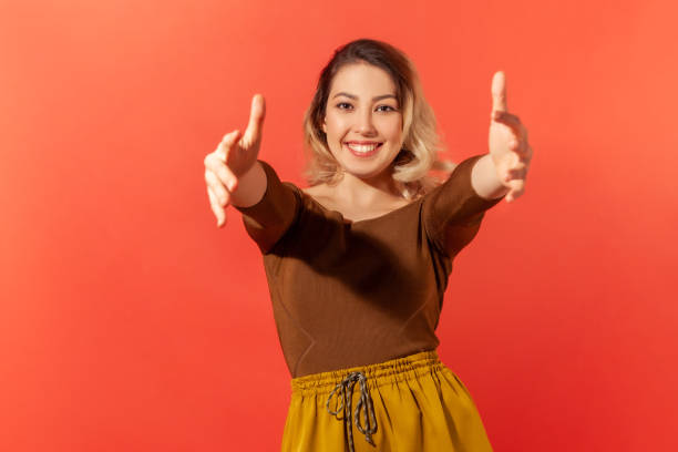 istock Woman stretching arms to hug 1294802843