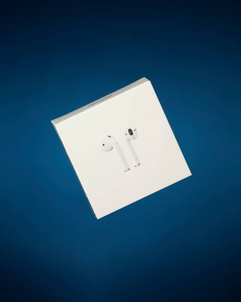 Jelgava, Latvia - 12.18.2020: Apple 
AirPods, wireless Bluetooth earbuds in white original box.