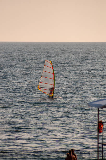 istock windsurfer on Black sea in summer day 1294805546
