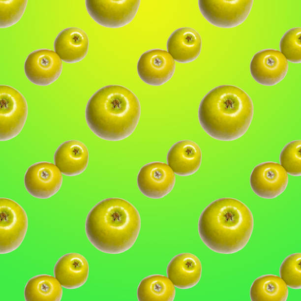 istock Green apples laid out in a pattern on a light green background, wallpaper, template, flat-lying 1294807589