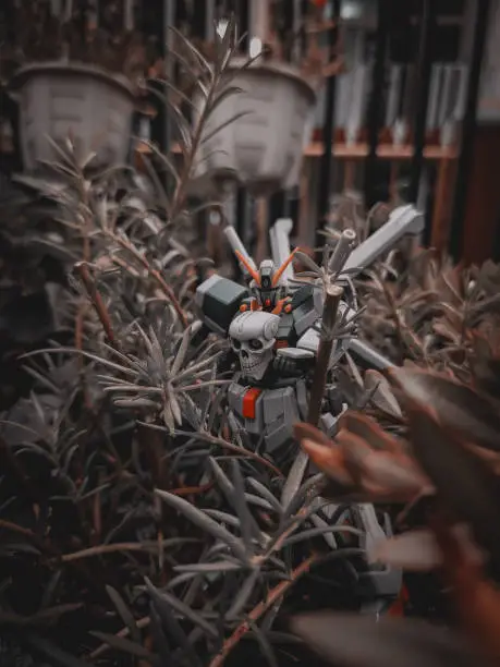 A close up shot of gundam in the plant