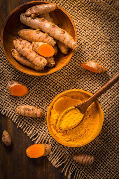 istock Turmeric root and powder (Curcuma longa) as cooking ingredient 1294817919
