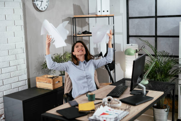 istock Beautiful young woman working on computer at her workplace 1294819397