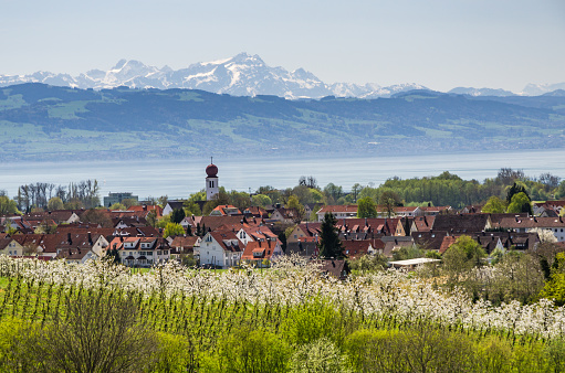 View of Kressbronn, Lake Constance and Saentis in foehn weather.