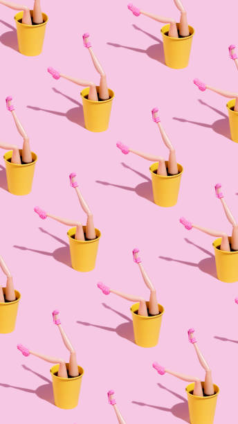 istock Coffee cup pattern with female doll legs and high heels on pink background 1294820105
