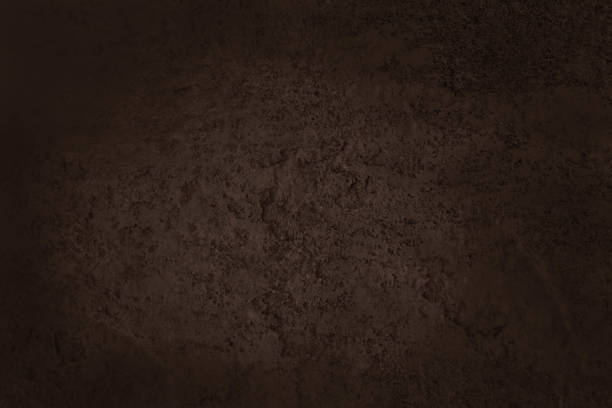istock Dark brown slate rock texture with high resolution, background of natural stone wall. 1294824075
