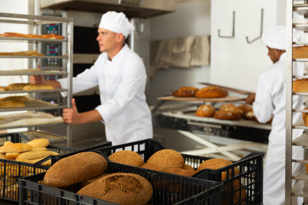 istock Fresh baked bread in crate in bakery 1294825493