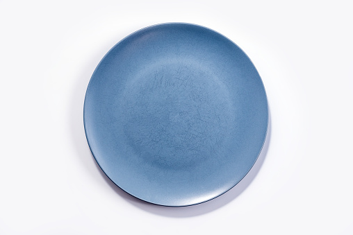 Empty Large Matte Navy Blue Plate isolated on white background top view