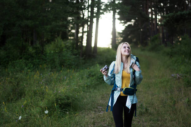istock Young woman enjoying the mountain view 1294836533
