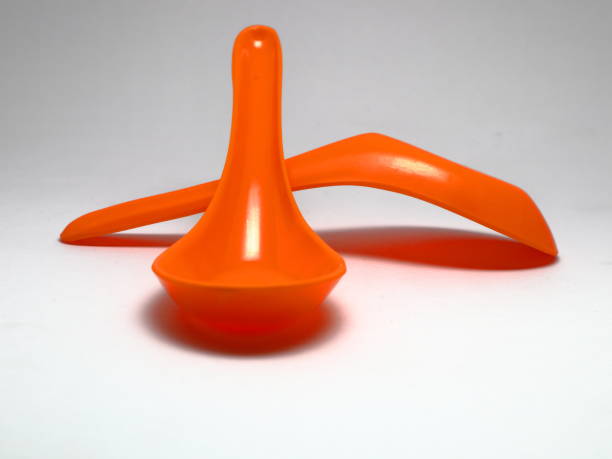 istock Orange Spoon Isolated on a White Background 1294846386
