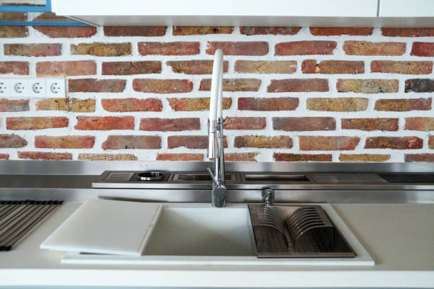 istock mixer and sink in a loft-style kitchen close up 1294847952