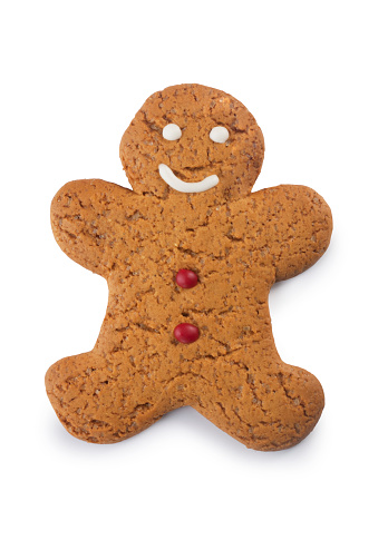 Studio shot of a gingerbread man cut out against a white background