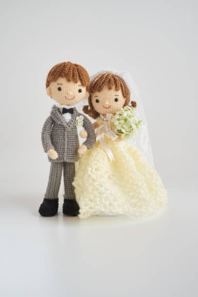 istock Small and cute Amigurumi doll.wedding 1294856207