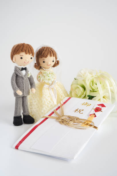 istock Small and cute Amigurumi doll.wedding 1294856339