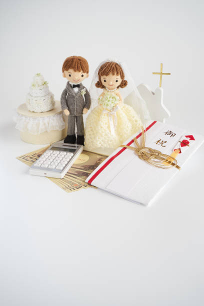 istock Small and cute Amigurumi doll.wedding 1294856389