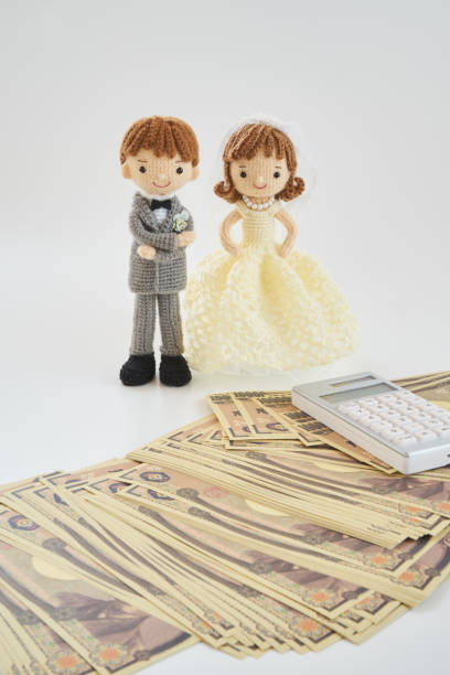 istock Small and cute Amigurumi doll.wedding 1294856543